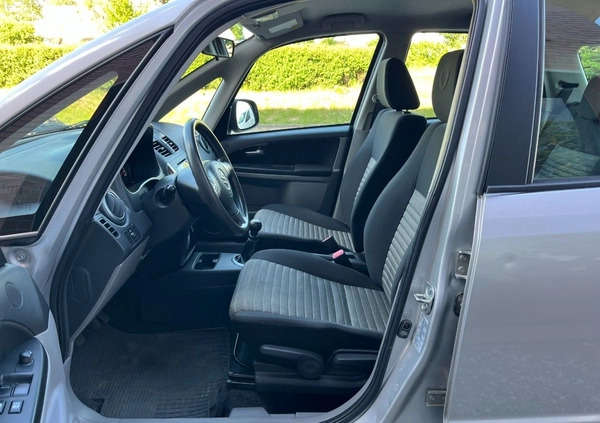 Suzuki SX4 cena 26900 przebieg: 153000, rok produkcji 2012 z Borne Sulinowo małe 254
